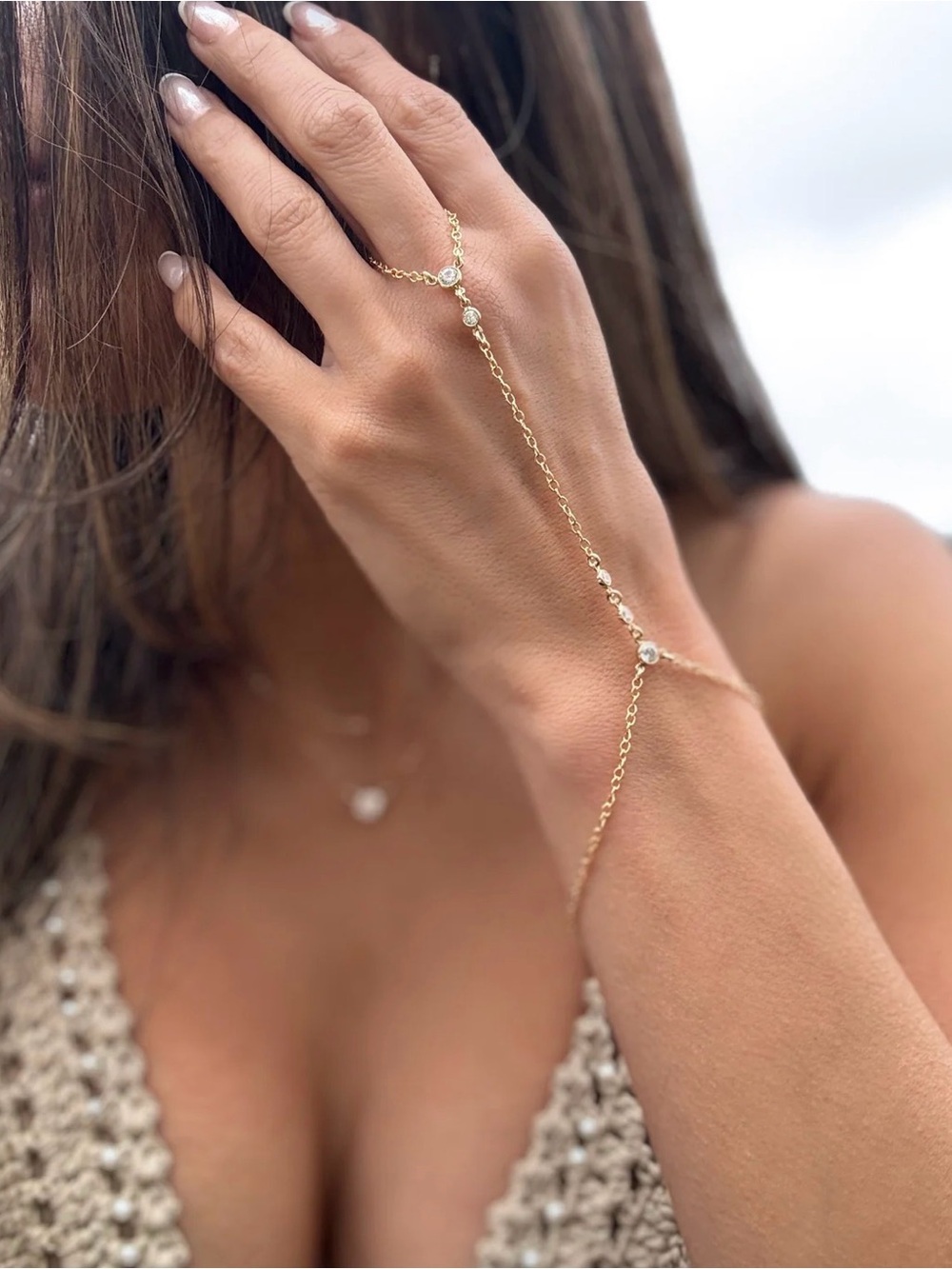 Delicate Gold Hand Chain with Cubic Zirconia Accents